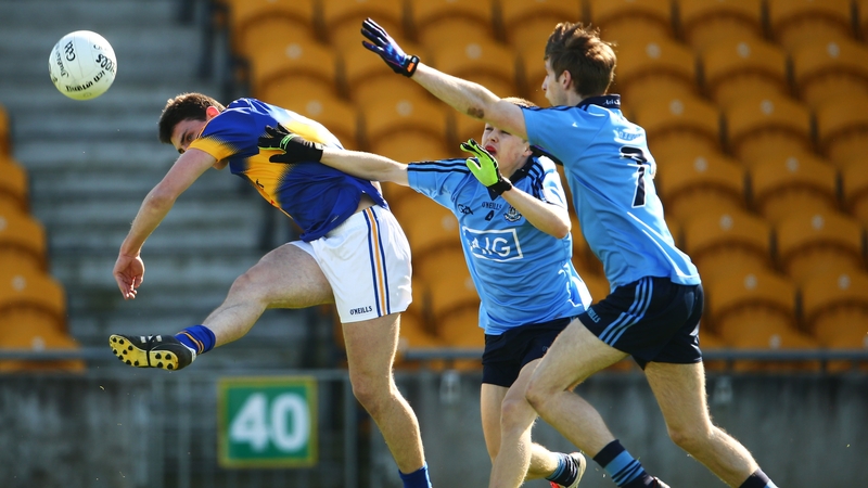 Tipperary's Colin O'Riordan under pressure from Eoin Murchan and Ross McGowan of Dublin