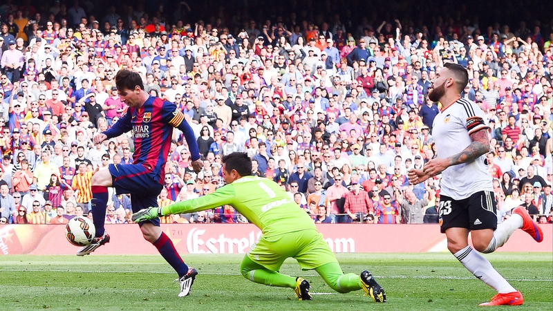 Lionel Messi grabs his 400th goal for Barcelona after taking two bites at the cherry to beat Valencia netminder Diego Alves