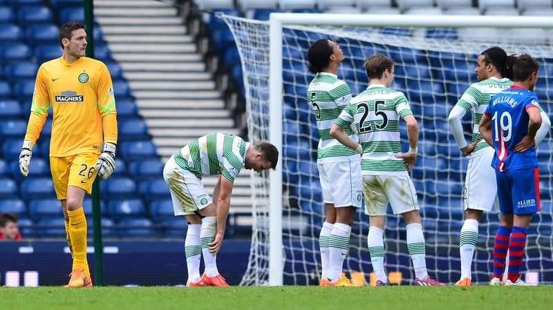 Celtic goalkeeper leaves the pitch after being sent off in the second half