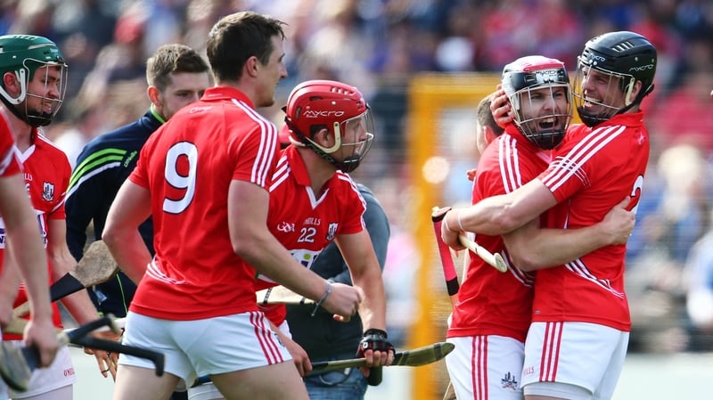 Cork's Paudie O’Sullivan and Shane O’Neill celebrate after the game