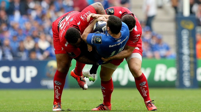Toulon's Mathieu Bastareaud and Guilhelm Guirado body slam Leinster's Rob Kearney
