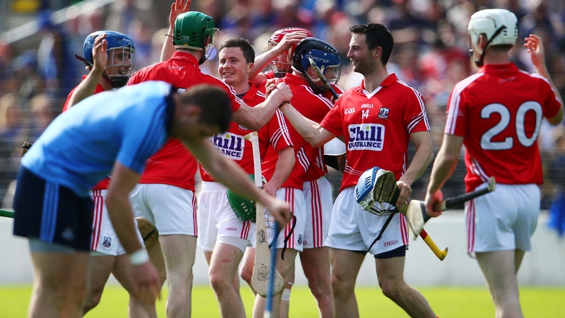 Cork players celebrate after pipping the Dubs for a place in the league decider