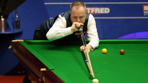 John Higgins was in impressive form in the first round at the Crucible