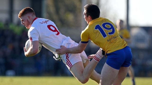 Evan McGrath of Roscommon with Cathal McShane of Tyrone during the U21 All-Ireland championship semi-final