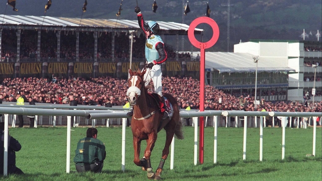Tony McCoy celebrates completing a Champion Hurdle-Gold Cup double in 1997 as Mr Mulligan lands chasing's Blue Riband