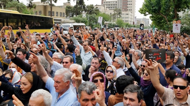 Hundreds of Iranian Armenians take part during a protest demonstration in front of the Turkish embassy in Tehran