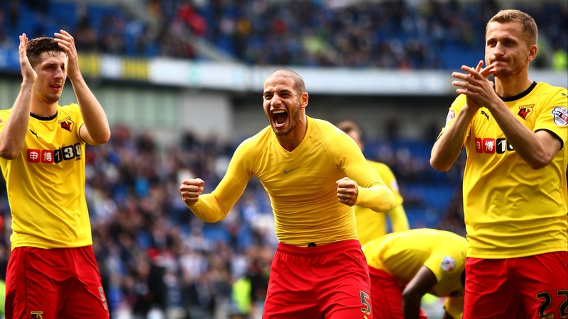 Watford players celebrate victory at Amex Stadium
