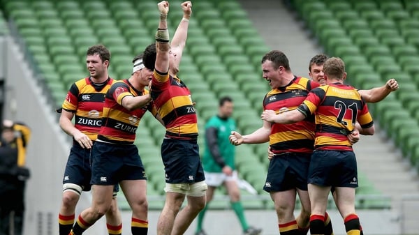 Lansdowne players celebrate scoring a try against Young Munster in the last seconds of extra time