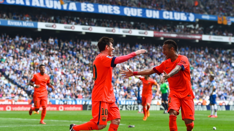 Lionel Messi celebrates with team-mate Neymar