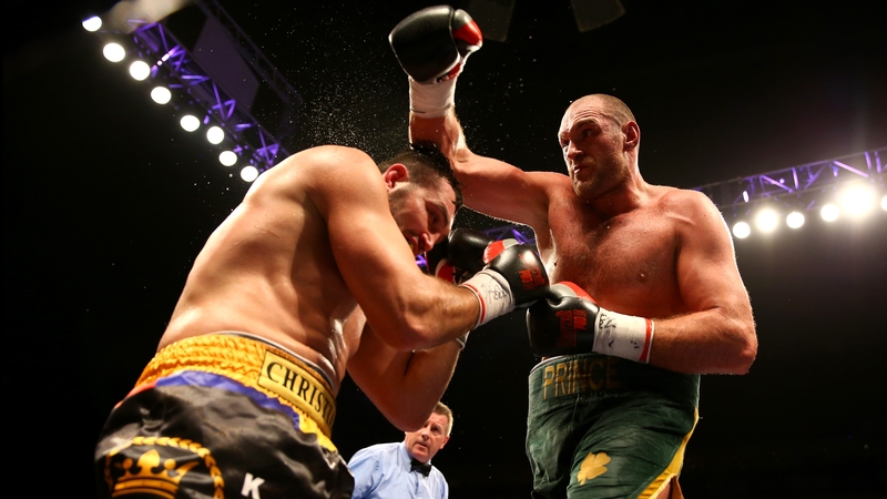 Tyson Fury (R) is a former Irish heavyweight champion