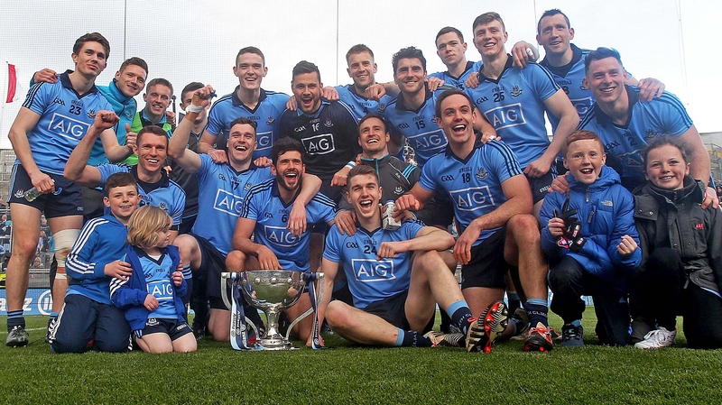 The Dublin team and supporters celebrate with the Division 1 trophy