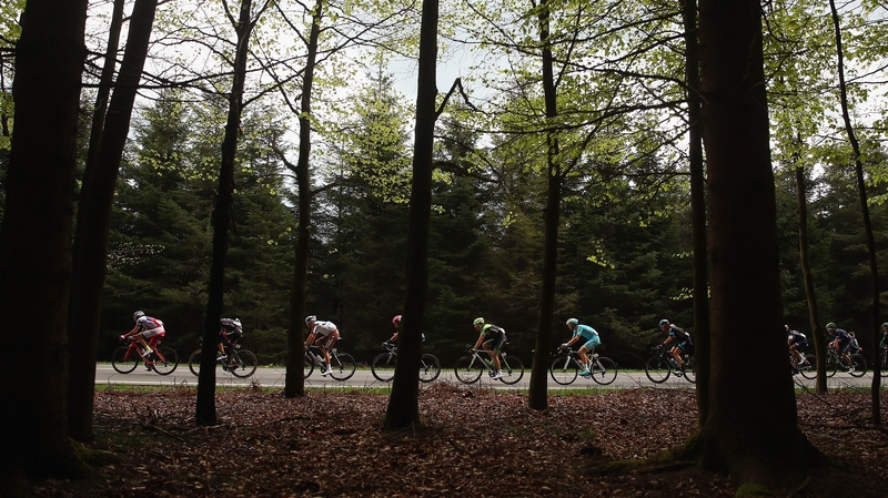 The peloton makes its way back to Liege