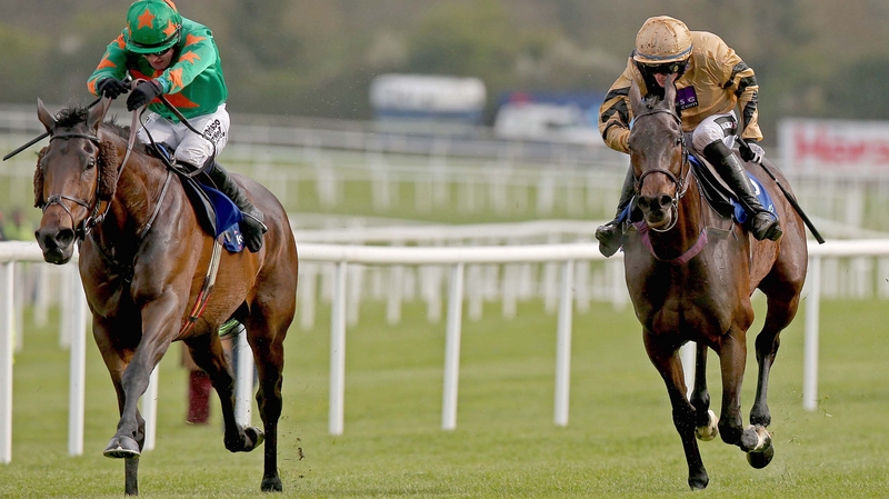 Felix Younger (right) ridden by Danny Mullins leads home Baily Green in the BoyleSports Champion Steeplechase