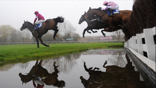 Sir Des Champs clears the water at Cheltenham in 2012