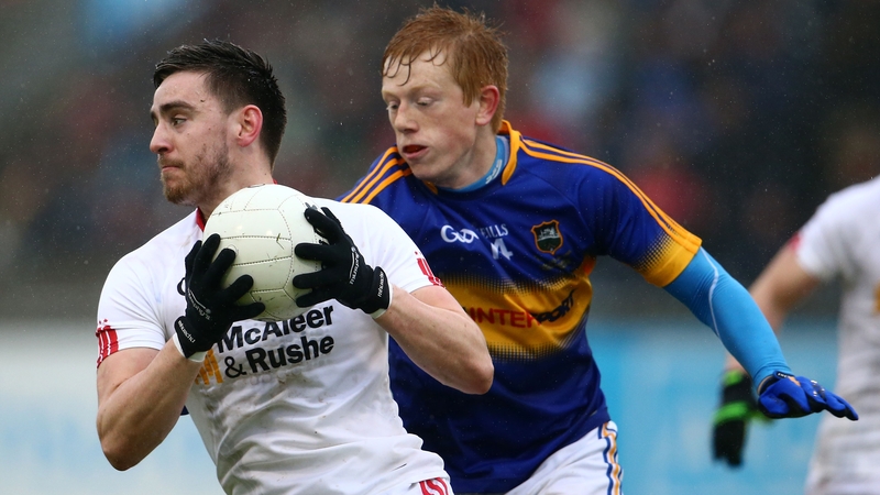Tipperary's Josh Keane puts pressure on Padraig Hampsey of Tyrone