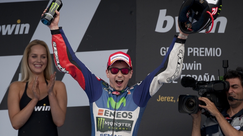 Jorge Lorenzo celebrates on the podium