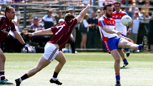 Sean Denvir of Galway attempts to block Ronan McGinley's effort