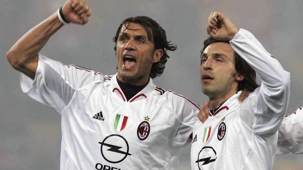 Paolo Maldini (L) with Andrea Pirlo