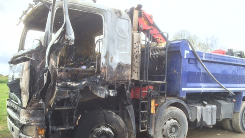 The suspected arson attack happened last night at a compound belonging to a contractor on the Lacken Road