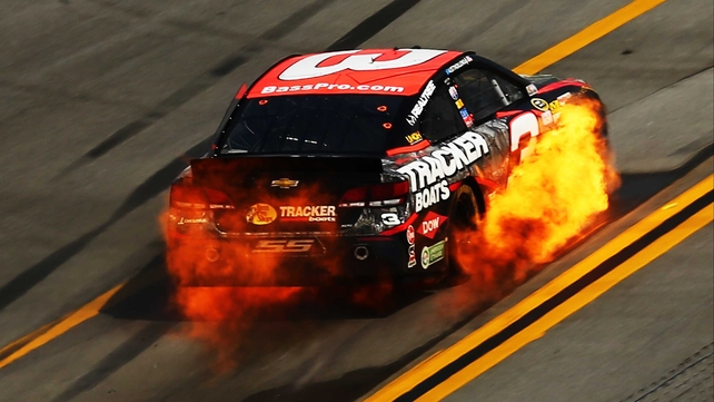 Austin Dillon's Bass Pro Shops Chevrolet goes up in flames at the NASCAR Sprint Cup Series GEICO 500 at Talladega Superspeedway in Alabama