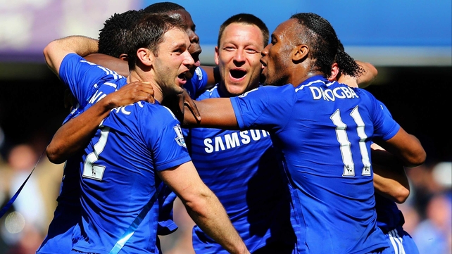 Branislav Ivanovic, John Terry and Didier Drogba celebrate winning the Barclays Premier League title after their 1-0 win over Crystal Palace at Stamford Bridge