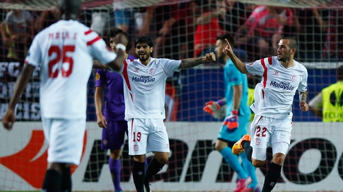 Aleix Vidal (r) of Sevilla celebrates the opener