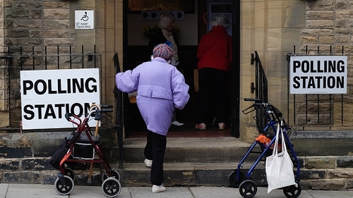 A woman walks into a polling station in Saltburn
