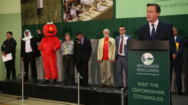 Elmo is among those listening to David Cameron's acceptance speech after winning his seat