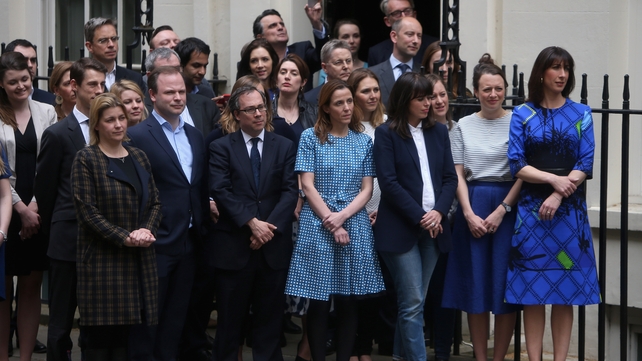 Samantha Cameron and staff in Downing Street watch as her husband speaks to the media