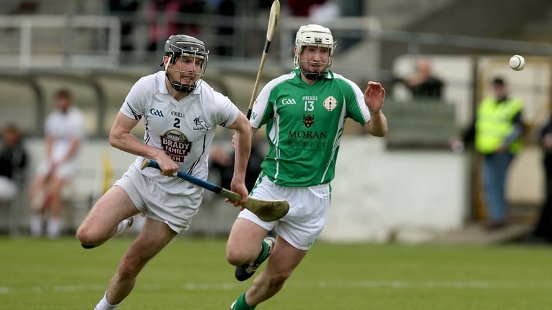 Niall O'Muineachain of Kildare competes for the ball with London's Michael Ivors