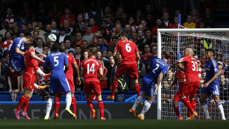 Chelseas defender John Terry (L) scores the opening goal