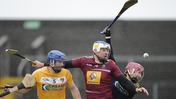 Antrim’s John Dillon and Chris O'Connell with Brendan Murtagh of Westmeath