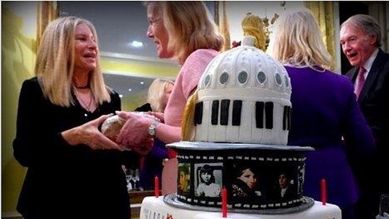 Barbra Streisand takes delivery from Her Excellency Anne Anderson Photo copyright: Barbra Streisand on Instagram