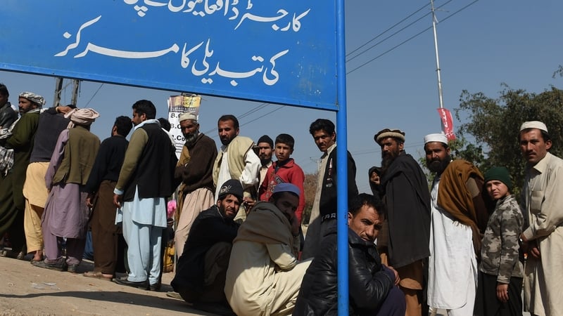 Afghan refugees queue to register in Pakistan