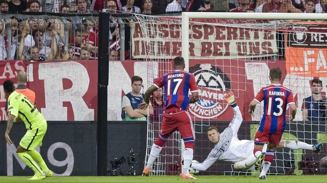 Neymar (L) scores for Barcelona against Bayern Munich in the Champions League at the Allianz Arena, Munich