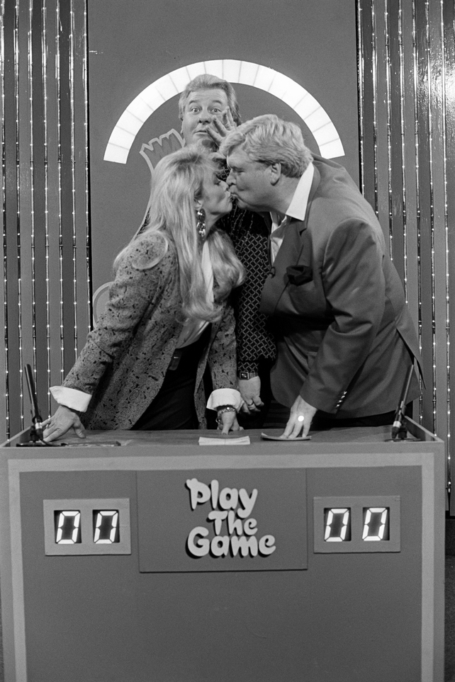 Twink and Davis kiss on set during a Play the Game recording at St Vincent's Hospital in 1992