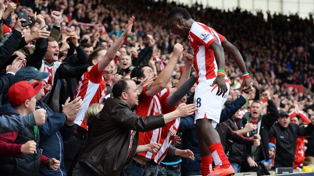 Mame Biram Diouf of Stoke City celebrates with fans during the Premier League match against Tottenham Hotspur at Britannia Stadium, Stoke on Trent