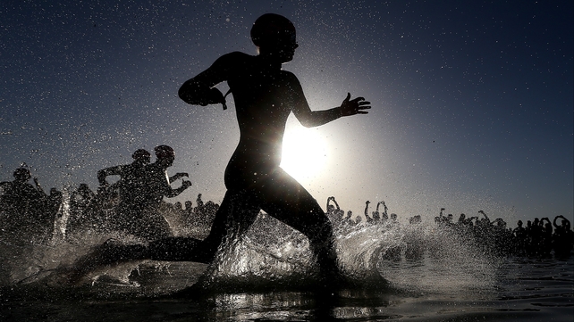 Elite women enter the water during Ironman 70.3 in Palma de Mallorca, Spain