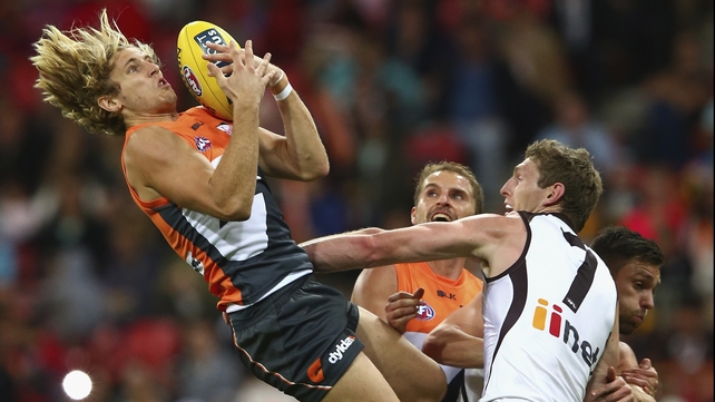 Nick Haynes makes a mark during the AFL match between the Greater Western Giants and the Hawthorn Hawks at Spotless Stadium in Sydney