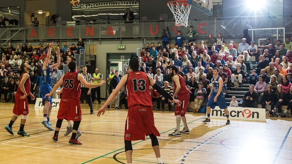 Colin O’Reilly of C&S UCC Demons tries to get the ball in the hoop