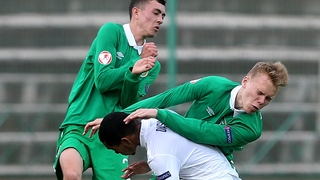 Ireland's Corey O'Keefe and Anthony Scully tackle Jay Dasilva of England