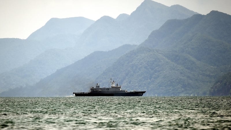 A Royal Malaysian Navy ship patrols along the Thai-Malaysia border looking for boats containing migrants