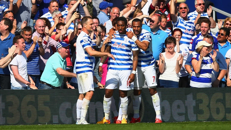 Leroy Fer is congratulated by his team-mates after giving QPR the lead at Loftus Road