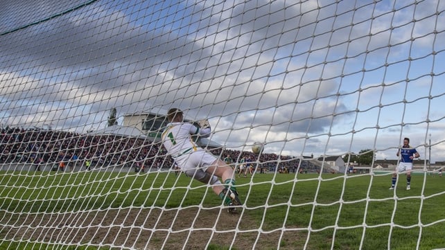 Offaly goalkeeper Alan Mulhall saves a penalty from Longford's Michael Quinn