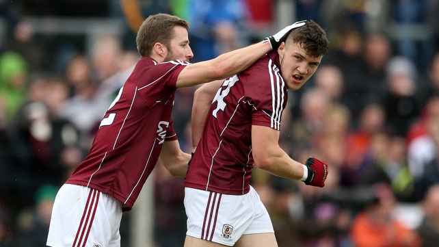 Galway’s Damien Comer celebrates scoring his side's first goal with Michael Lundy