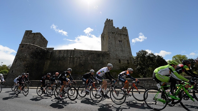 The riders pass Cahir Castle