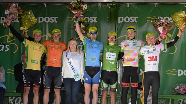 Miss An Post Rás Tracy Byrne with (left to right) yellow jersey holder Lukas Postlberger, second-placed Alex Frame, county jersey winner Ian Richardson, sprint jersey winner Aaron Gate, king of the mountains leader Robert Patrick & U23 leader Jaap de Man
