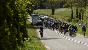 Traffic one way, the peloton the other