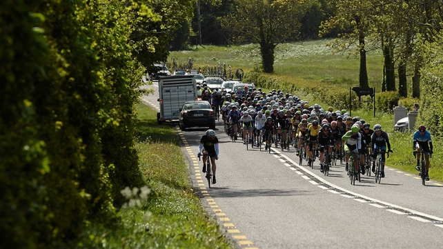 Traffic one way, the peloton the other