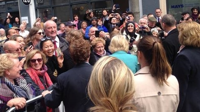 People turn out to meet Camilla as she arrives at the Druid Theatre, Galway